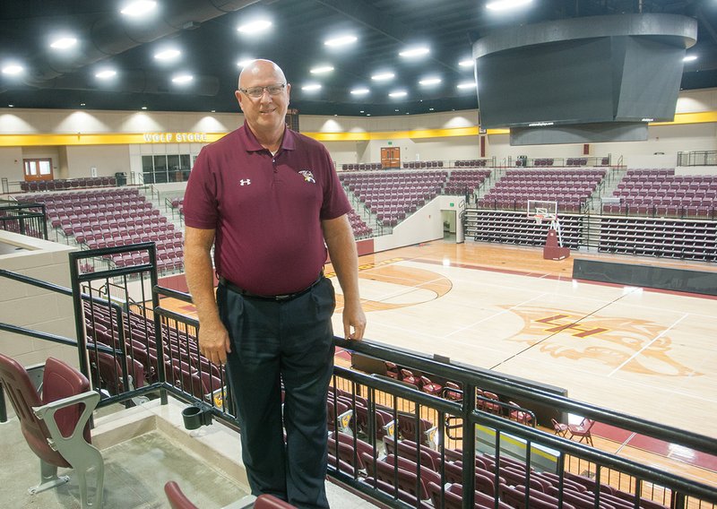 Rick Waters, the new athletic director for the Lake Hamilton School District in Pearcy, stands on the concourse of Wolf Arena, which opened during the 2016-17 school year. Waters, who was previously superintendent of the Genoa Central School District in Texarkana, was hired by the Lake Hamilton district in June and started as AD on July 1. This year is his 32nd year in education.