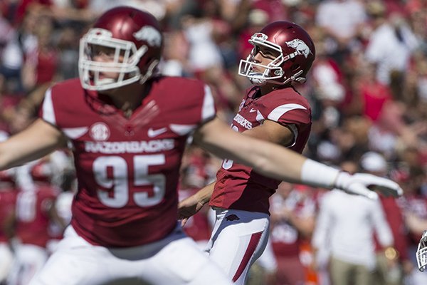 Arkansas kicker Connor Limpert watches an extra-point attempt go through the uprights during a game against New Mexico State on Saturday, Sept. 30, 2017, in Fayetteville. 