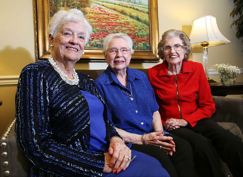 Earlene Henry (from left), Martha Westberg and Rhea Segraves Dunegan sit together Wednesday at Butterfield Trail Village in Fayetteville. The three women participated in 1937 short films that were recently rediscovered. 
