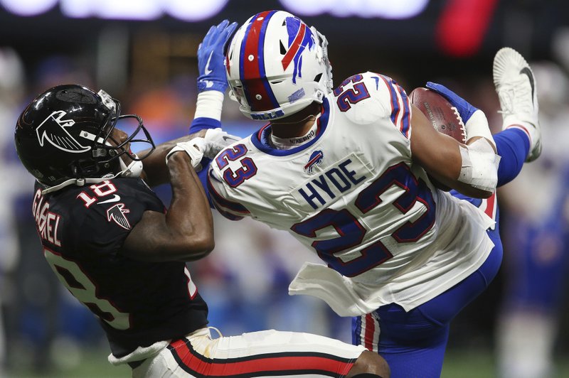 Buffalo Bills strong safety Micah Hyde (23) intercepts a pass intended for Atlanta Falcons wide receiver Taylor Gabriel (18) during the second half of an NFL football game, Sunday, Oct. 1, 2017, in Atlanta. (AP Photo/John Bazemore)