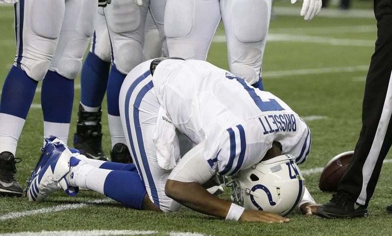 Indianapolis Colts quarterback Jacoby Brissett rests on the turf after he was sacked in the second half of an NFL football game against the Seattle Seahawks, Sunday, Oct. 1, 2017, in Seattle. (AP Photo/Elaine Thompson)