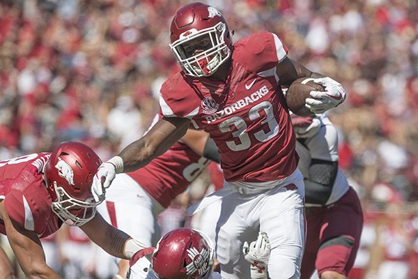 Arkansas running back David Williams carries the ball during a game against New Mexico State on Saturday, Sept. 30, 2017, in Fayetteville. 