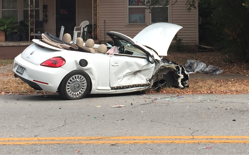 City Director Doris Wright lost control of her convertible Tuesday after a suspect in a disturbance jumped in it, authorities said.