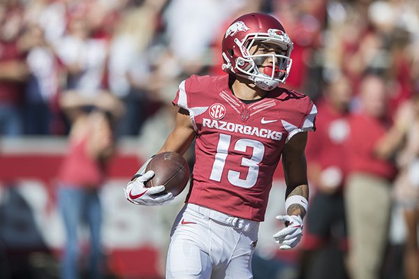 Arkansas receiver Deon Stewart reacts to scoring a touchdown during a game against New Mexico State on Saturday, Sept. 30, 2017, in Fayetteville. 