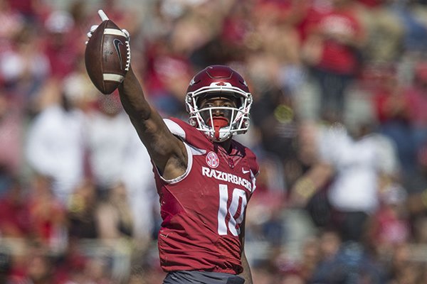 Arkansas receiver Jordan Jones signals first down during a game against New Mexico State on Saturday, Sept. 30, 2017, in Fayetteville. 