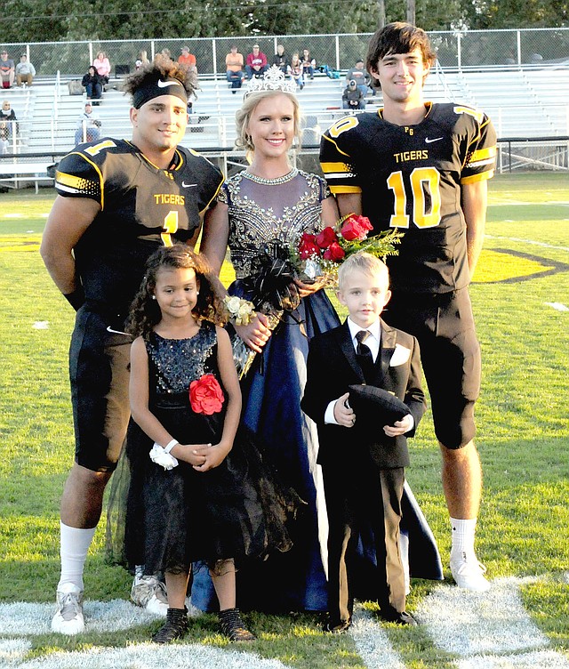 MARK HUMPHREY ENTERPRISE-LEADER 2017 Homecoming queen, Emily Smith, daughter of Doug and Christina Smith, escorted by captains of the game, Anthony Johnson (left), son of Andrea Harrel and Jamal Johnson; and John David Elder, son of John and Carla Elder; and attendants Anniyah Hood, daughter of Andrea Harrell and Lucas Hood; and Hunter Kidd, son of Doug and Cindi Kidd.