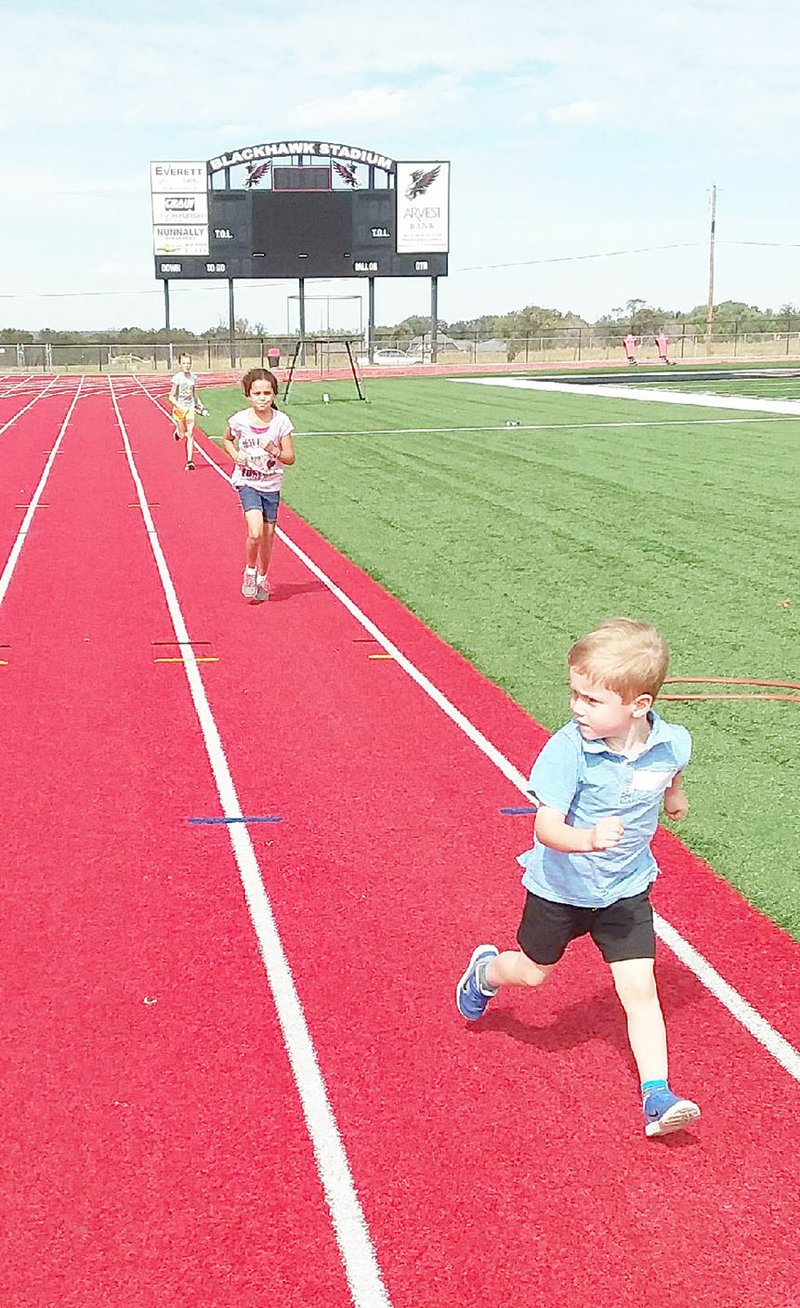 Elijah Smith, Pea Ridge Pre-kindergarten student, was one of the children involved in the memorial race Sunday.