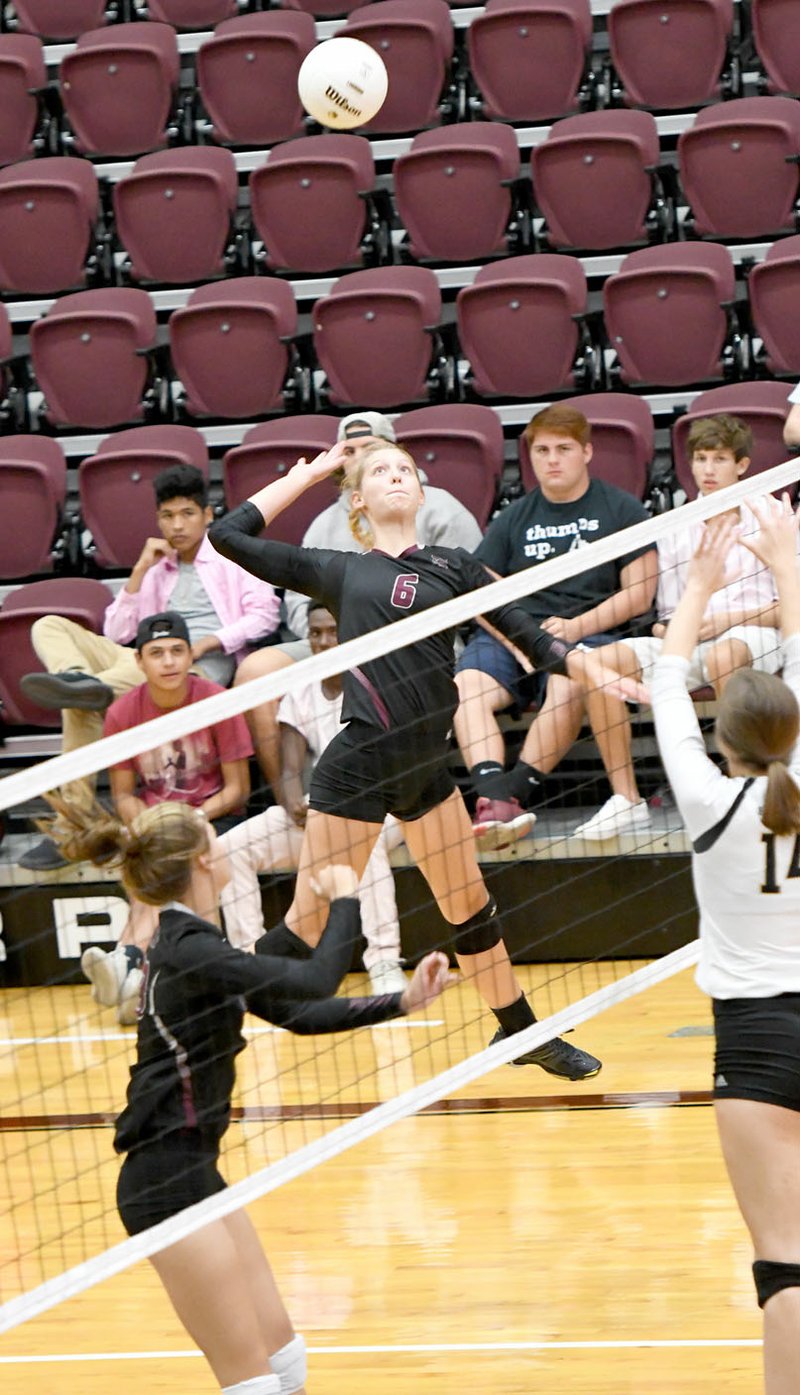 Bud Sullins/Special to the Herald-Leader Siloam Springs junior Ellie Lampton goes up for a hit Monday against Broken Arrow (Okla.) in a nonconference match inside Panther Activity Center.