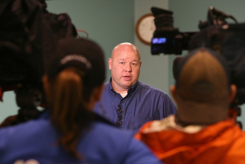 NWA Democrat-Gazette/DAVID GOTTSCHALK Lt. Jeff Taylor, with the Springdale Police Department, discusses Wednesday a shooting that occurred on Oriole Street near the intersection of Cardinal Drive in Springdale. A 16-year-old male was taken to Northwest Medical Center-Springdale with life-threatening injuries after being shot Tuesday night, according to police.