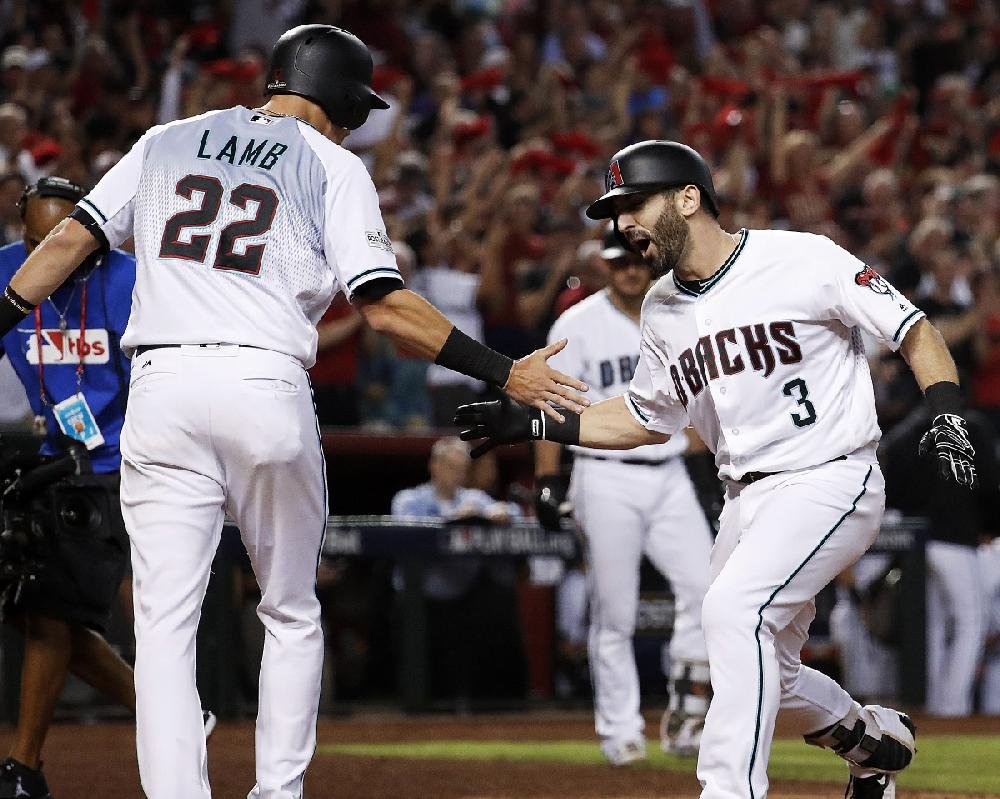 Daniel Descalso of the Arizona Diamondbacks hits a two run home