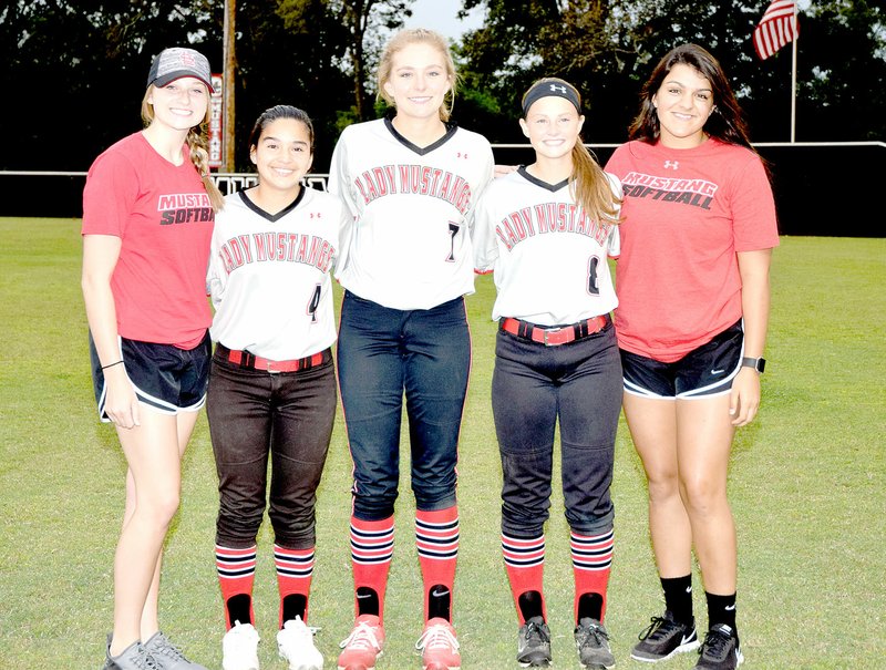 Photo by Rick Peck McDonald County High School honored the senior members of the 2017 Lady Mustang softball team on Sept. 26 following McDonald County&#8217;s 5-1 loss to Monett. From left to right: Meagan Mills (manager), Miryan Martinez, Kenzie Stephens, Cloee Helm and Rebekah Hitt (manager).