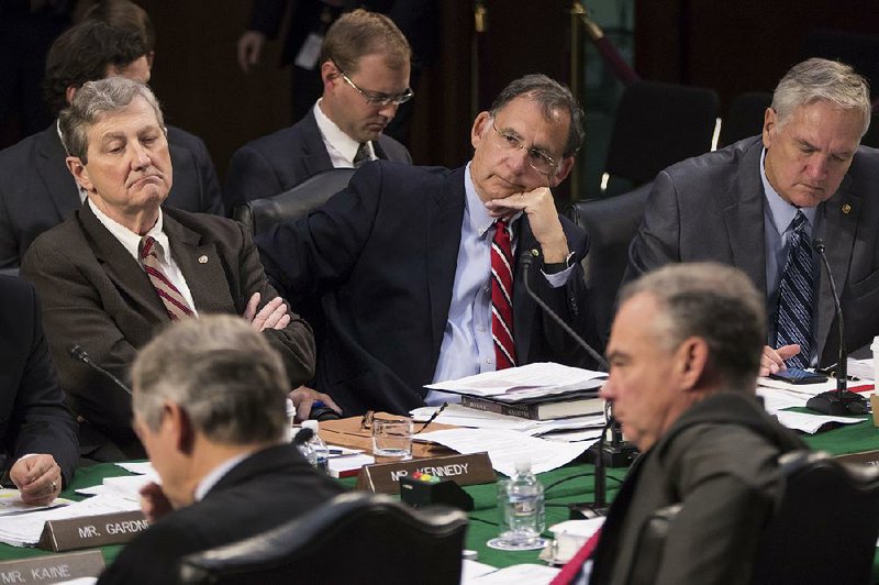U.S. Sens. John Kennedy (left) of Louisiana and John Boozman (right) of Arkansas join other members of the Senate Budget Committee on Thursday in approving the Senate’s budget resolution, which has key differences from the House proposal.
