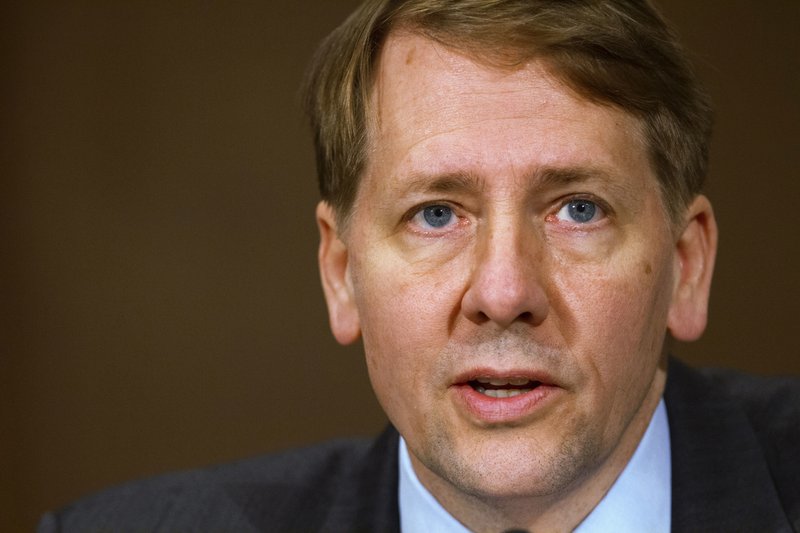 In this Nov. 12, 2013, file photo, Consumer Financial Protection Bureau Director Richard Cordray testifies before a Senate Committee on Banking hearing on Capitol Hill in Washington. The CFPB announced new restrictions Thursday, Oct. 5, 2017, on the payday lending industry, a move that is likely to face resistance in Congress. 