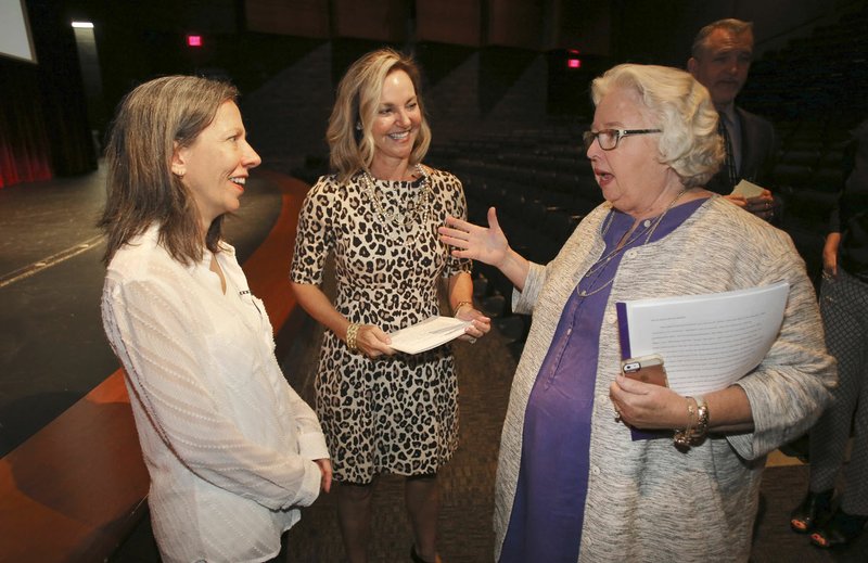 NWA Democrat-Gazette/DAVID GOTTSCHALK Kathleen DuVal (from left), Laura Underwood and Martha McNair, all 2017 Fayetteville Schools Hall of Honor inductees visit Thursday at Fayetteville High School's Performing Arts Center. The three were on campus to speak with juniors and seniors. The Hall of Honor commemorates educators, alumni, and friends who have demonstrated extraordinary fidelity, honor, and service to Fayetteville Public Schools and community.