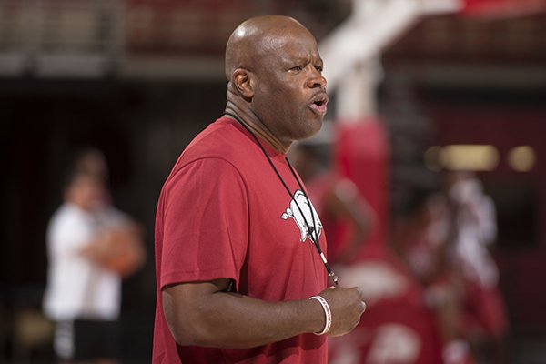 Arkansas coach Mike Anderson talks to players during practice Tuesday, Oct. 3, 2017, in Fayetteville. 