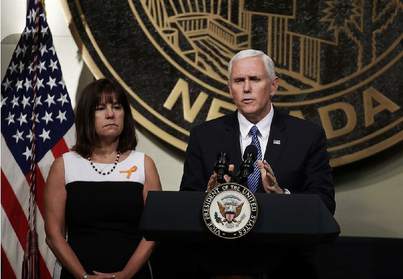 Vice President Mike Pence, with his wife, Karen, said Saturday in Las Vegas that the names and stories of the people killed last week “will forever be etched into the hearts of the American people.”  
