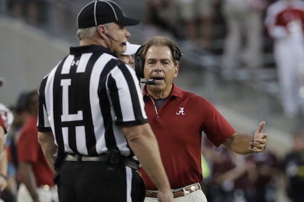 Alabama coach Nick Saban yells to an official during the first quarter of an NCAA college football game against Texas A&M Saturday, Oct. 7, 2017, in College Station, Texas. (AP Photo/David J. Phillip)