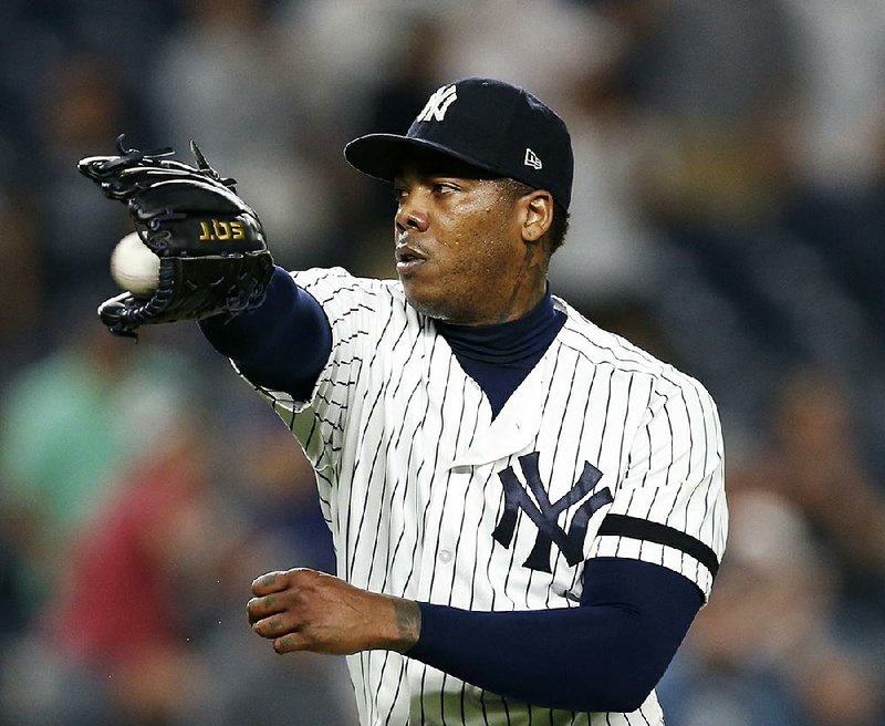 New York Yankees relief pitcher Aroldis Chapman apologized to Manager Joe Girardi after liking a comment
on Instagram that called the Yankees manager an “imbecile.”