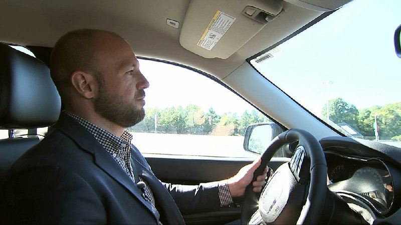 In this image from video, Jake Nelson — AAA’s director for traffic safety advocacy and research — drives one of the test vehicles used in the study in Washington, earlier this month.
