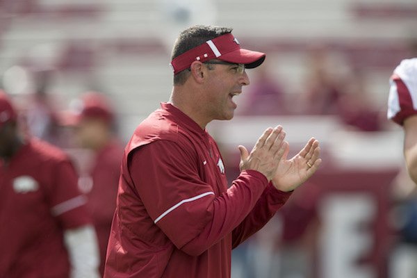 Dan Enos, Arkansas offensive coordinator, during warmups before taking on South Carolina Saturday, Oct. 7, 2017, at Williams-Brice Stadium in Columbia, S.C. 
