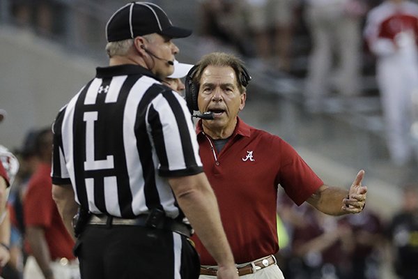 Alabama coach Nick Saban yells to an official during the first quarter of an NCAA college football game against Texas A&M Saturday, Oct. 7, 2017, in College Station, Texas. (AP Photo/David J. Phillip)

