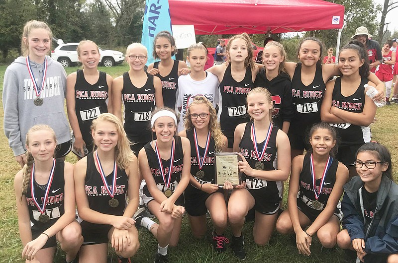 Jr. Lady Blackhawks tookfirst place in the 1A-5A meet in Springdale.
