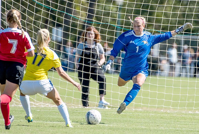 Photo courtesy of JBU Sports Information John Brown freshman goalkeeper lines up a kick during Saturday's homecoming match against Mid-America Christian (Okla.) at Alumni Field. The Golden Eagles won 2-1 to extend their home winning streak to 27 straight matches.