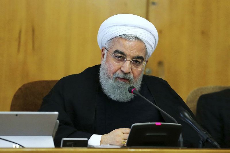 Iranian President Hassan Rouhani speaks Wednesday during a Cabinet meeting in Tehran. Rouhani said if the U.S. backs out of the nuclear deal, “it won’t be our failure at all, but a failure for the other side.”  
