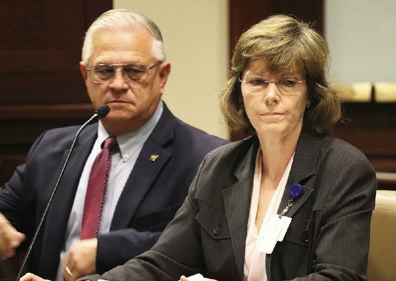 Correction Department Director Wendy Kelley testifies Wednesday at a meeting of the Charitable, Penal and Correctional Institutions Subcommittee of the Arkansas Legislative Council in Little Rock. The panel is looking into a recent uptick in violence at the state’s prisons. With Kelley is Dale Reed, the department’s chief deputy director. 