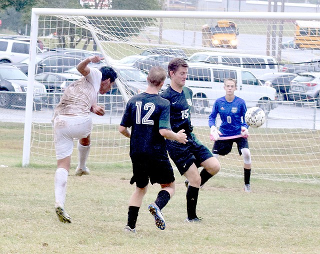 Photo by Rick Peck McDonald County's Alfredo Sanchez lets loose a shot during the Mustangs 2-0 win over College Heights on Oct. 5 at MCHS.