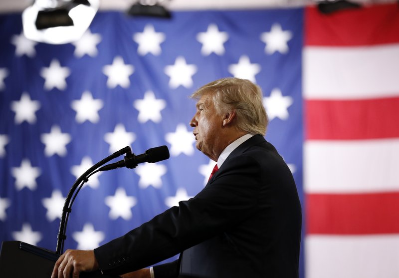 President Donald Trump speaks about tax reform during an event at the Harrisburg International Airport, Wednesday Oct. 11, 2017, in Middletown, Pa. (AP Photo/Alex Brandon)