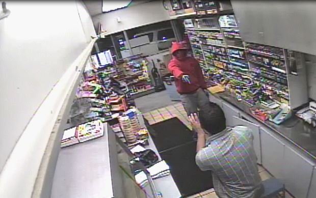 Police are investigating an aggravated robbery where a man held a Pine Bluff gas station clerk at gunpoint, security footage shows.