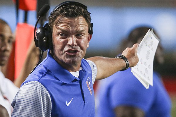 Parkview coach Brad Bolding talks to players during a game against Benton on Friday, Sept. 8, 2017, at War Memorial Stadium in Little Rock. 