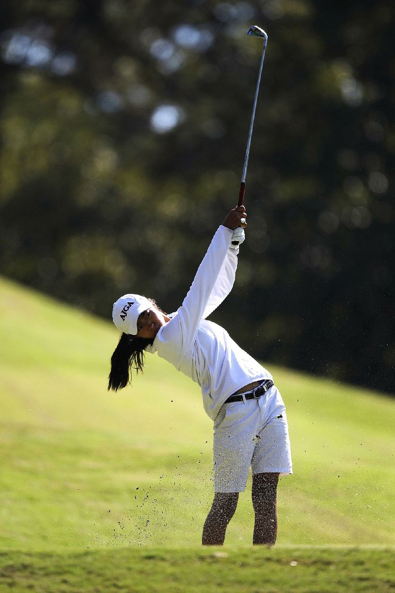 Forrest City’s Elizabeth Moon tees off on the fourth hole during the Girls High School Overall Championship on Thursday at Pleasant Valley Country Club in Little Rock. Moon shot a 2-under 70 to win the championship by three strokes over Baptist Prep’s Katelyn Dunstan.