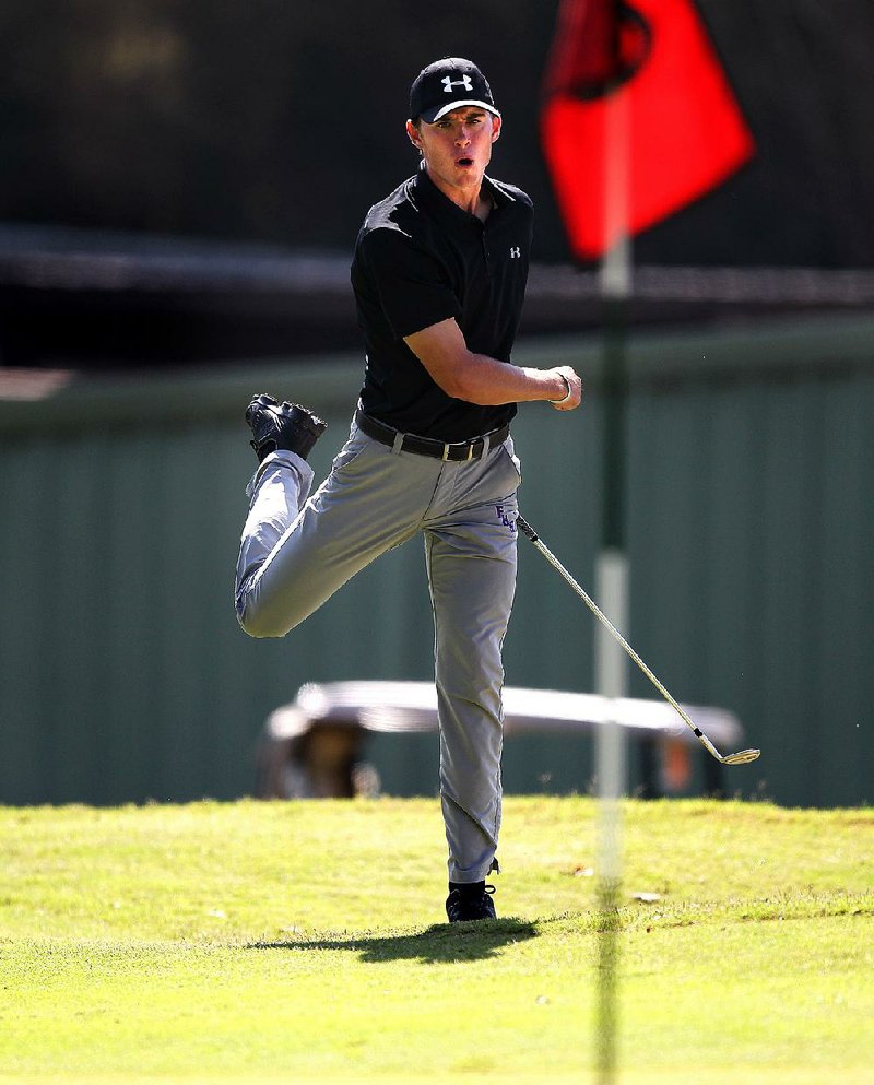 Fayetteville’s Fisher Vollendorf celebrates after sinking his chip shot from the edge of the 10th green for an eagle at the Boys High School Overall Championship on Thursday at Pleasant Valley Country Club in Little Rock. Vollendorf finished as runner-up to defending state champion Connor Gaunt of Cabot by one stroke.