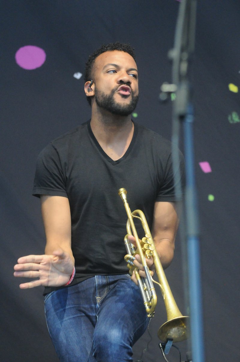 Trumpet/sousaphone player Jon Lampley demonstrates his animated stage presence at the Walmart AMP in May while performing with Ohio rock/jam band O.A.R.