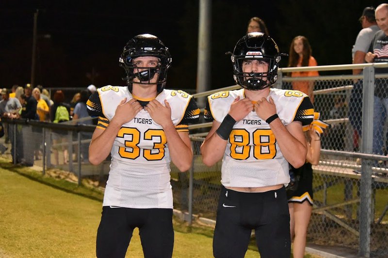 Stone (left) and Colin Bryant are two-way starters for the 6-0 Prairie Grove Tigers. Stone leads the Tigers with six receiving touchdowns while Colin leads the team with five interceptions.