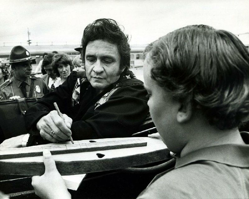 Even after he became an international superstar, Johnny Cash often returned to his home state, such as in this 1976 visit. 
