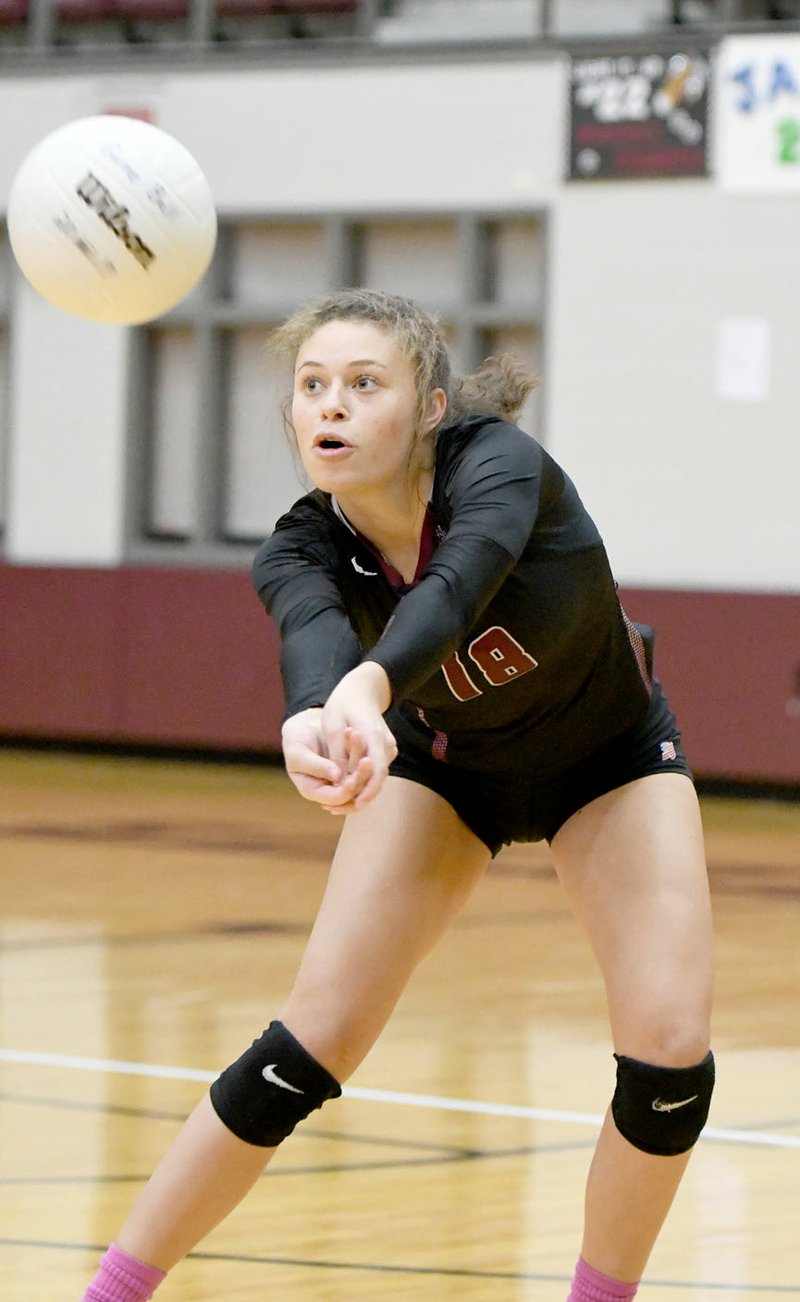 Bud Sullins/Special to Siloam Sunday Siloam Springs senior volleyball player Kirsten Loftis digs a ball last Tuesday on senior night against Greenwood.