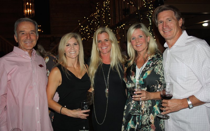 Carl Collier (from left), Meredith Dowse, Helen Carlton and Leslie and Scott Bailey help support Restore Humanity at Winetopia on Oct. 6.