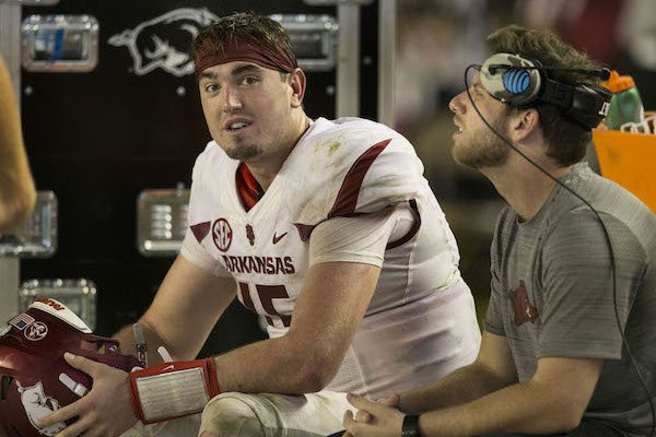 Cole Kelley (left), Arkansas backup quarterback and Austin Allen, Arkansas' starting quarterback who is sitting out with an injury, talk as the defense takes on Alabama in the fourth quarter Saturday, Oct. 14, 2017, at Bryant-Denny Stadium in Tuscaloosa, Ala.
