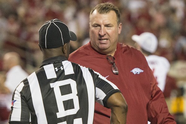 Arkansas coach Bret Bielema talks to a referee during a 41-9 loss at Alabama Saturday, Oct. 14, 2017, at Bryant-Denny Stadium in Tuscaloosa, Ala. 
