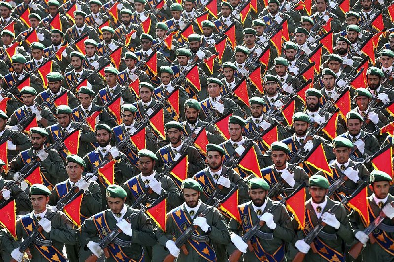 Members of Iran’s Revolutionary Guard march in a military parade Sept. 21, 2016, in Tehran, marking the 36th anniversary of Iraq’s invasion of Iran. European allies expressed fears over the weekend that President Donald Trump’s decision to alter the nuclear agreement with Iran increases the threat of war and the danger of spilling over into other conflicts.
