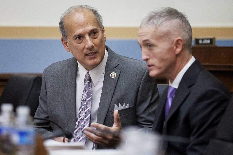 Rep. Tom Marino (left), R-Pa., confers with Rep. Trey Gowdy, R-S.C., in this November 2015 photo. Marino, now President Donald Trump’s nominee for director of the Office of National Drug Control Policy, was for years chief advocate for a law passed in 2016 that effectively stripped the Drug Enforcement Administration of the power to control the flow of prescription narcotics despite a rising death rate from opioid use.