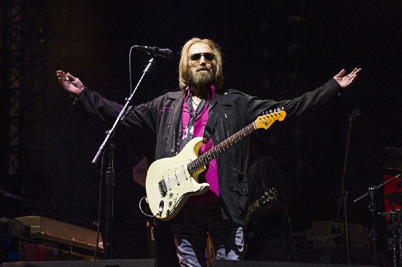 FILE - In this Sept. 17, 2017, file photo, Tom Petty of Tom Petty and the Heartbreakers appears at KAABOO 2017 in San Diego, Calif. Petty has died at age 66. Spokeswoman Carla Sacks says Petty died Monday night, Oct. 2, 2017, at UCLA Medical Center in Los Angeles after he suffered cardiac arrest. (Photo by Amy Harris/Invision/AP, File)