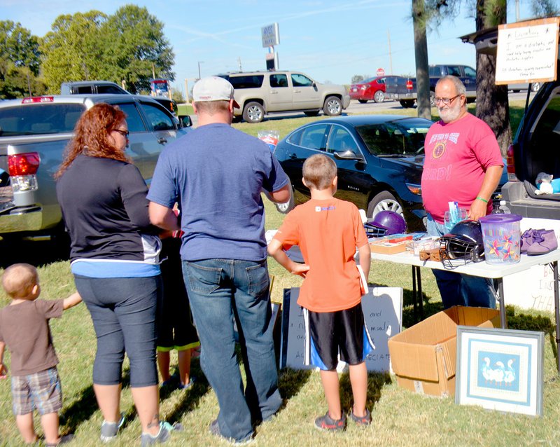 Janelle Jessen/Herald-Leader Vendors can sell all kinds of items during the community garage sale.