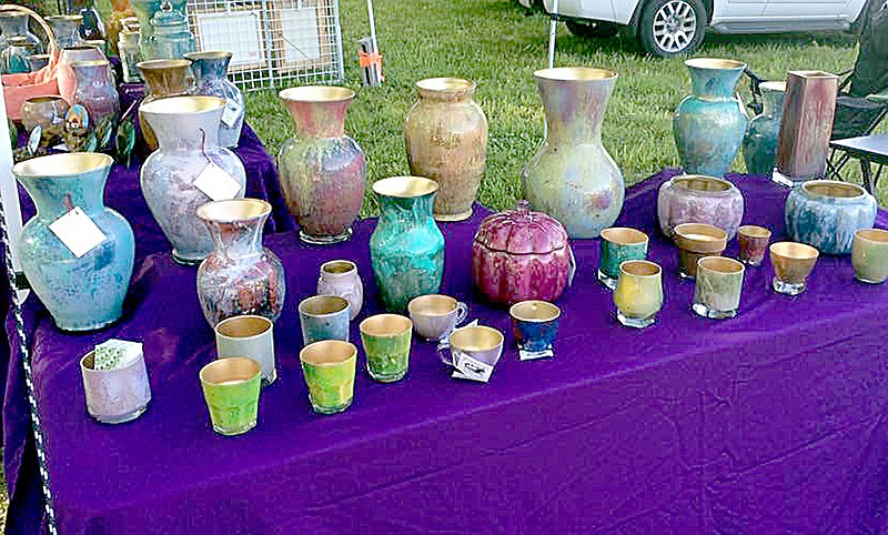 Photo submitted For eleven years, Sandy and Ed Prill have been selling their Peacock Glass in Bella Vista at the Arts and Crafts Festival.