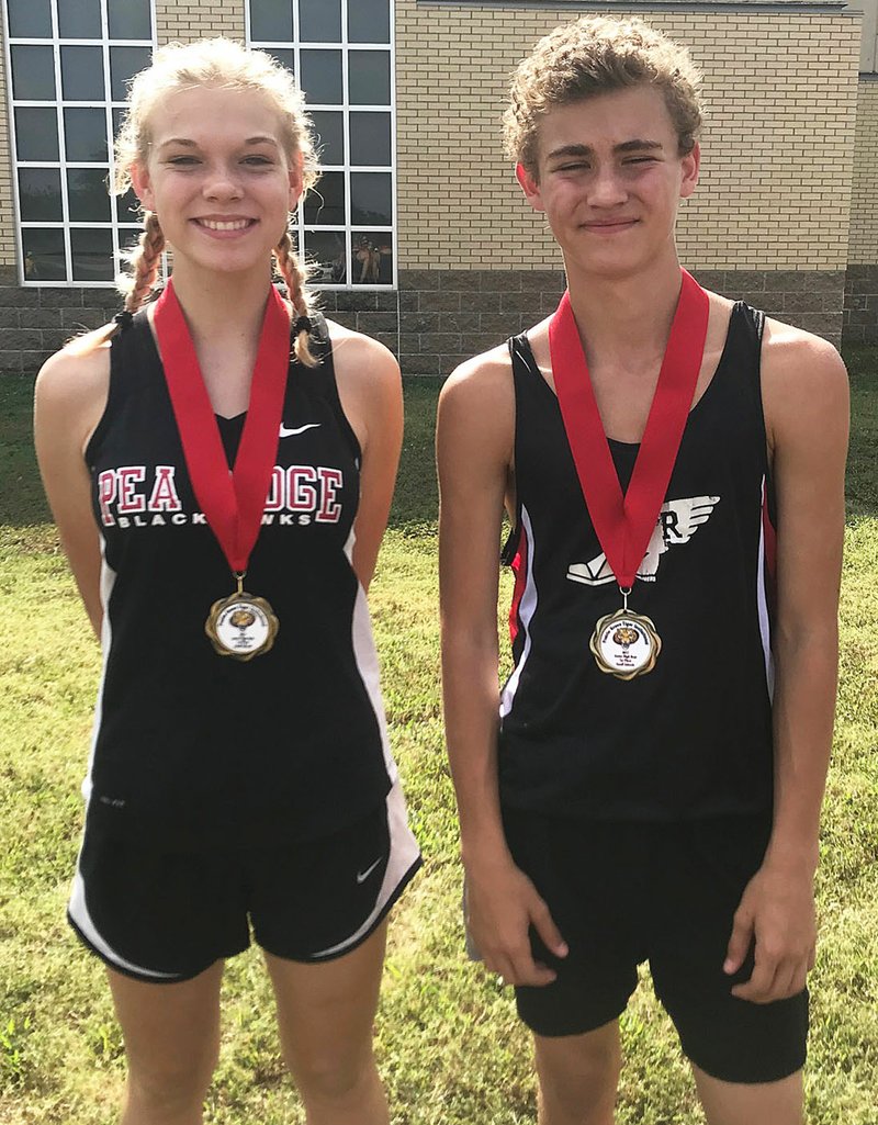 Pea Ridge runners took first place individual awards in both Jr. High divisions at the Prairie Grove meet this weekend by runners Adelina Means and Gavin Stanley. 