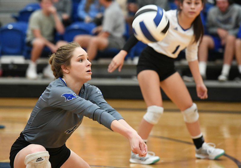 NWA Democrat-Gazette/J.T. WAMPLER Rogers' Anna Randels digs a serve from Springdale Tuesday Oct. 17, 2017. Rogers won in three sets 25-15, 25-18, 25-14 to claim 4th place in the 7A-West.