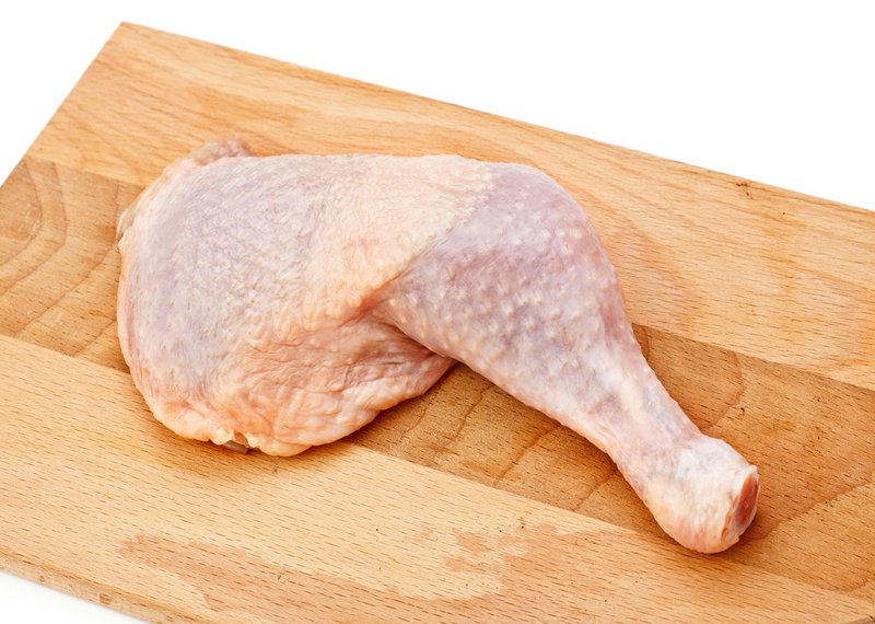 The thigh bones should be removed before stuffing and steaming the chicken legs.
